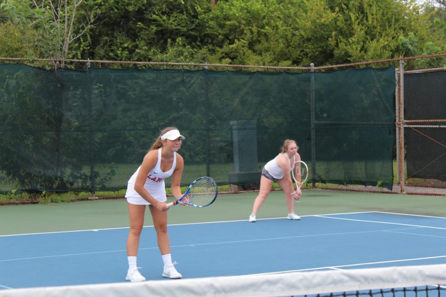 Pia Indrevoll (left), a foreign exchange student, has taken her new life in stride, joining the tennis team among other new activities. 