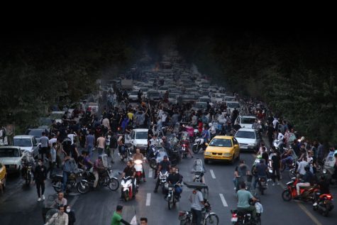 A picture obtained by AFP outside Iran on September 21, 2022, shows Iranian demonstrators in the capital Tehran during a protest for Mahsa Amini. 