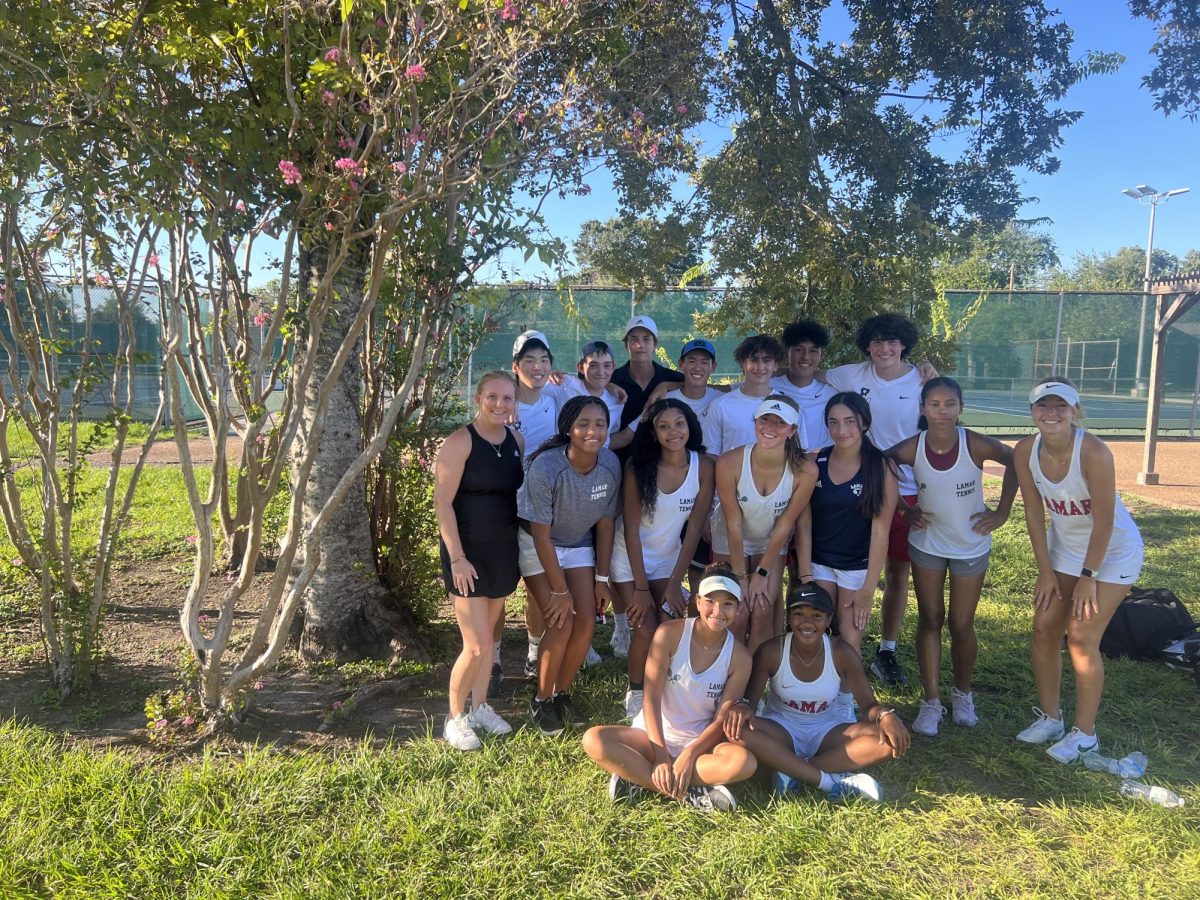 The tennis team celebrates their victory after numerous challenging matches.