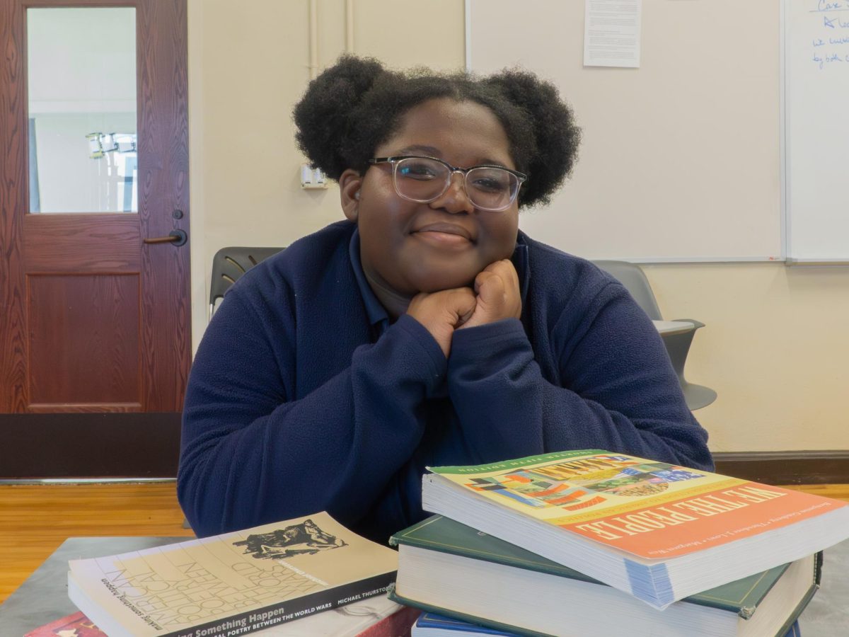 Junior Dream Steamer shows off her law books for her attorney club.